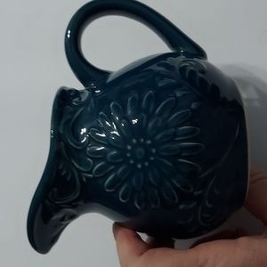 Dark Teal Creamer,flowers,scrolls, 4.5in.Hx5in.W.with handle.